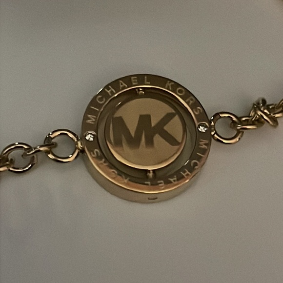 Michael Kors gold flip glitz 4 charms bracelet. - Picture 4 of 8